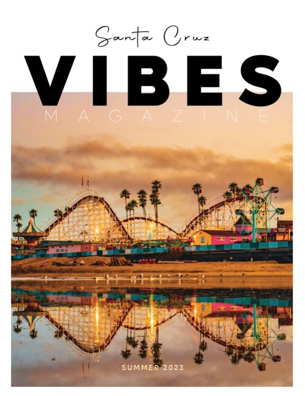 Santa Cruz Vibes Issue 1 from Summer 2023 with cover image of Santa Cruz Beach Walk captured by Todd Harper from Main Beach in Santa Cruz, CA